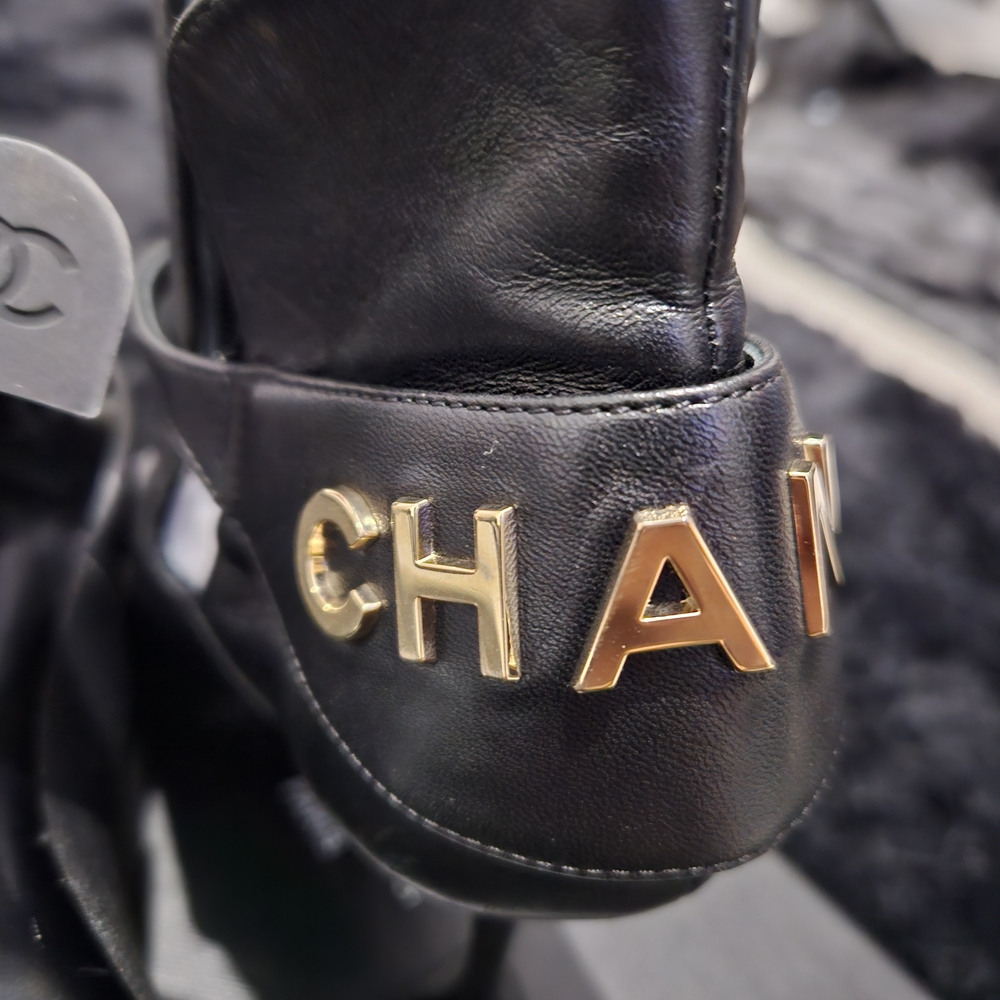 CHANEL Black Ankle Boots with Gold Accents - Picture 2 of 7